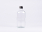 Preview: Klarglasflasche 500ml, mit Schraubverschluss schwarz/weiss