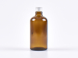 Preview: Braunglasflasche 100ml, mit Aludeckel gold/silber