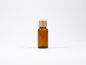 Preview: Braunglasflasche 20ml, mit Tropfmontur Gold