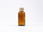 Preview: Braunglasflasche 50ml, mit Tropfmontur Gold