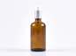 Preview: 100ml-kosmetikflasche-glas-lotionspumpe-gold