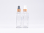 Preview: Klarglasflasche Miro 100ml - Lotionspumpe Bambus