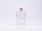 Preview: Klarglasflasche Miro 100ml - Pipette gold