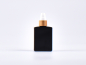 Preview: Schwarzglasflasche Miro 100ml - Lotionspumpe Bambus