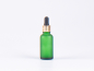 Preview: Grünglasflasche 30ml, mit Pipette gold