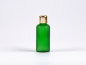 Preview: Grünglasflasche 50ml, mit Tropfmontur Gold
