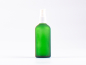 Preview: Grünglasflasche 100ml, mit Lotionpumpe Kunststoff