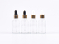 Preview: Klarglasflasche 100ml, mit Pipette gold