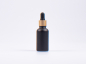 Preview: Schwarzglasflasche 30ml, mit Pipette gold