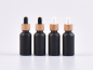 Preview: Schwarzglasflasche 50ml, mit Pipette Bambus