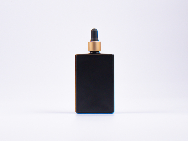 Schwarzglasflasche Miro 100ml - Pipette gold