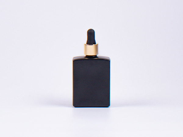 Schwarzglasflasche Miro 50ml - Pipette gold
