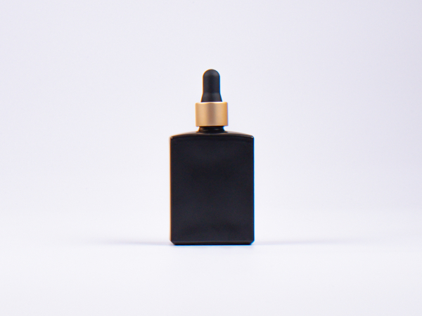 Schwarzglasflasche Miro 50ml - Pipette gold