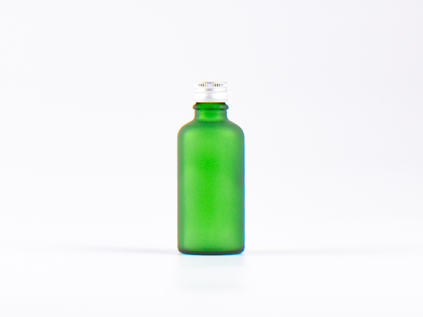 kosmetikflasche-glas-schwarzmatt-golddeckel