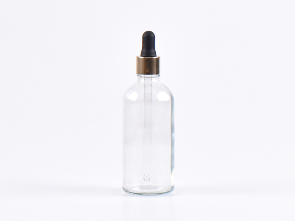 Klarglasflasche 100ml, mit Pipette gold