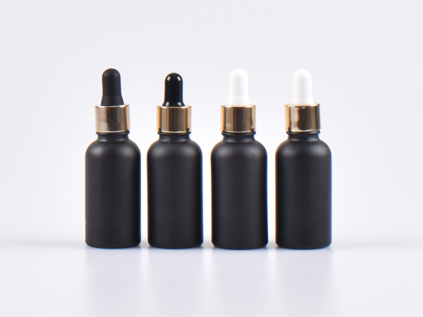 Schwarzglasflasche 30ml, mit Pipette gold