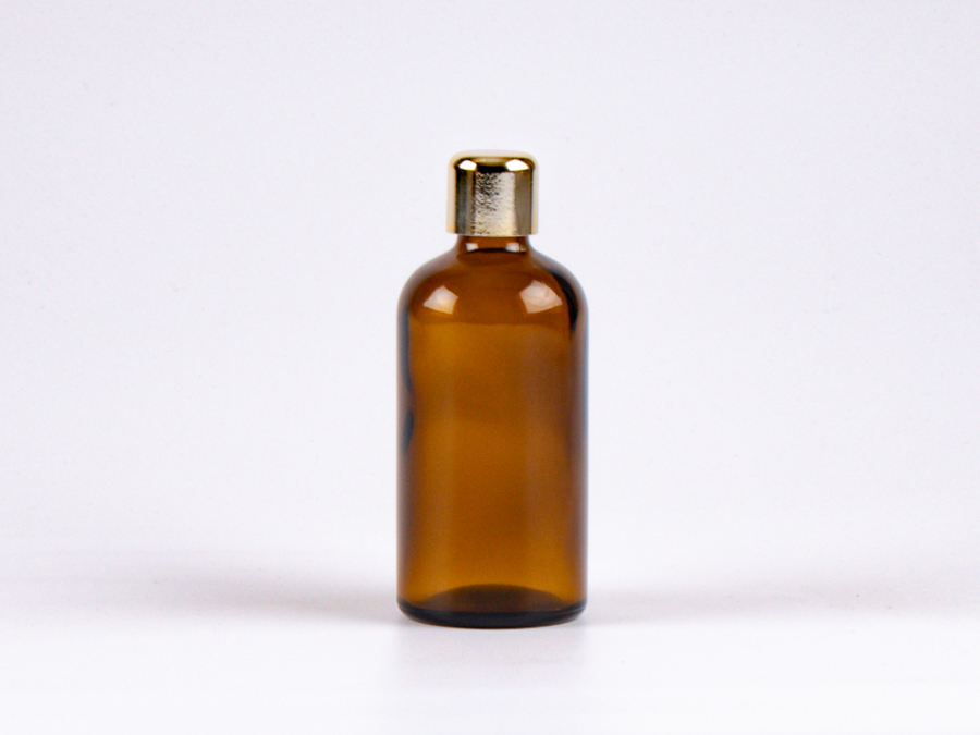 Braunglasflasche 100ml, mit Tropfmontur Gold