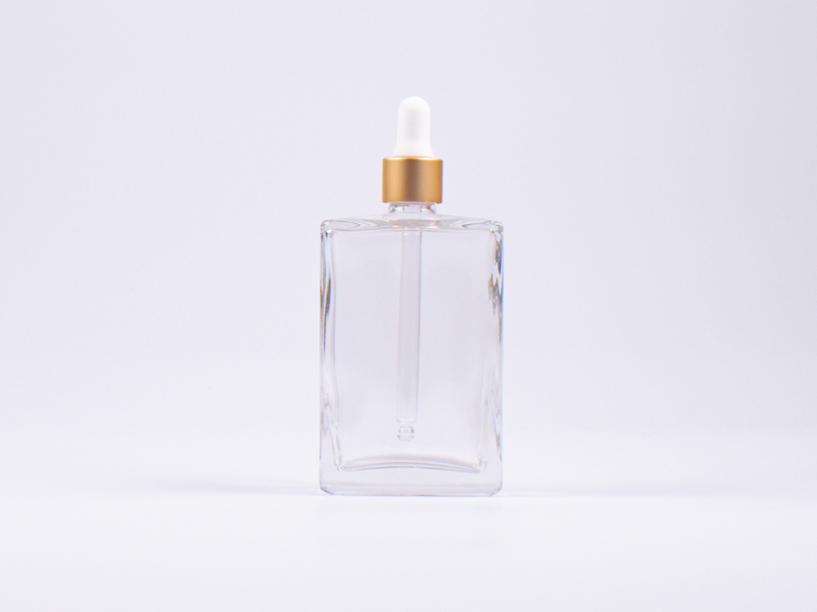 Klarglasflasche Miro 100ml - Pipette gold