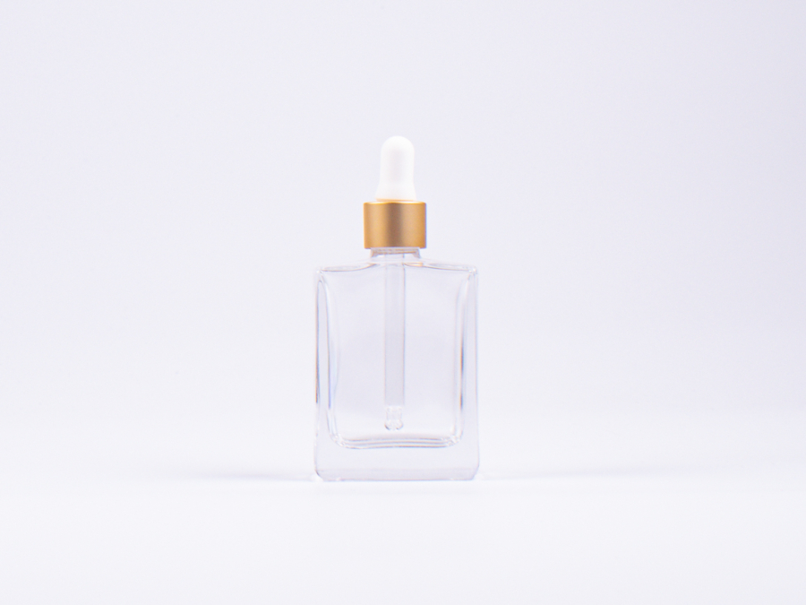 Klarglasflasche Miro 50ml - Pipette gold