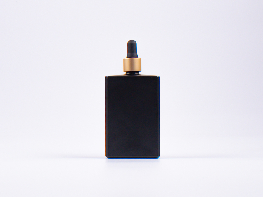 Schwarzglasflasche Miro 100ml - Pipette gold