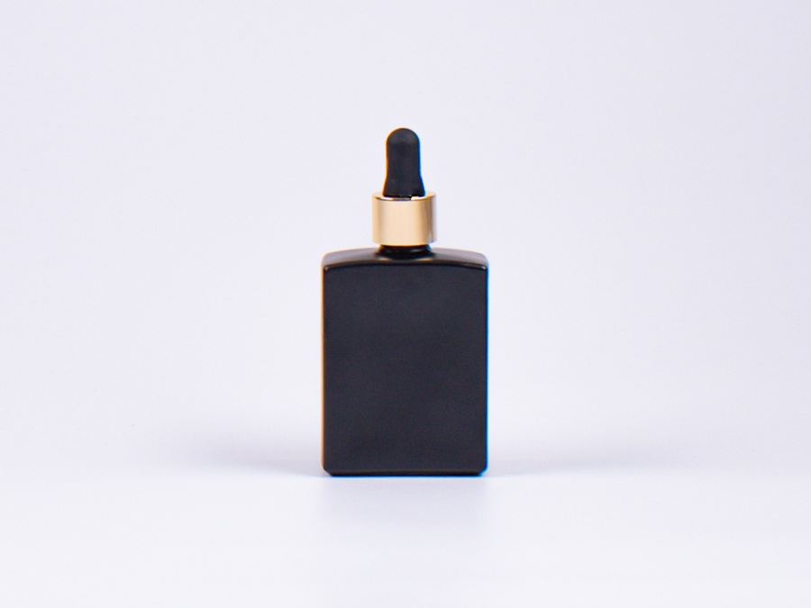 Schwarzglasflasche Miro 50ml - Pipette gold