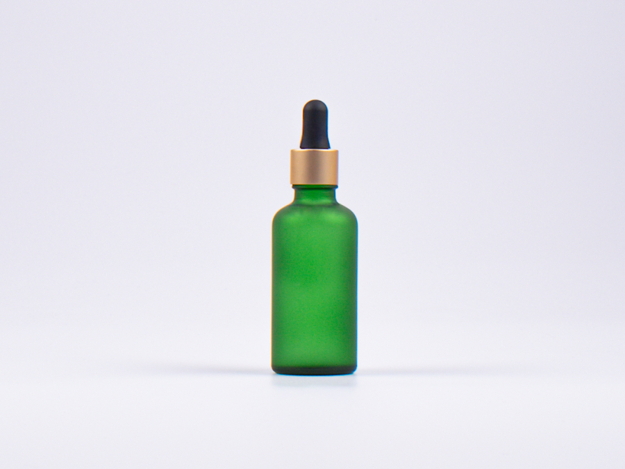 Grünglasflasche 50ml, mit Pipette gold