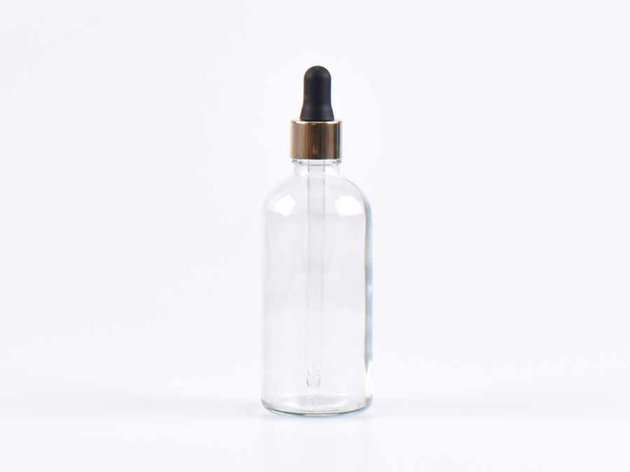 Klarglasflasche 100ml, mit Pipette gold