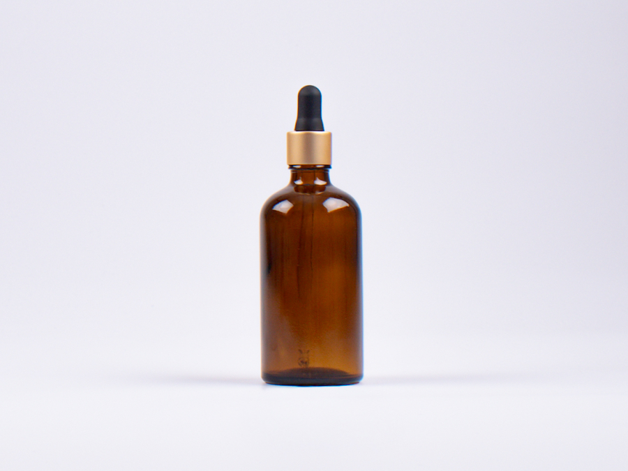 Braunglasflasche 100ml, mit Pipette gold