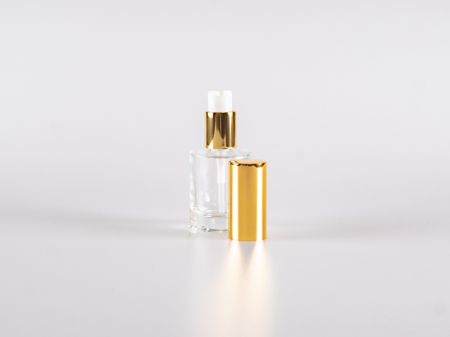 kosmetikflasche-glas-silber-pumpe