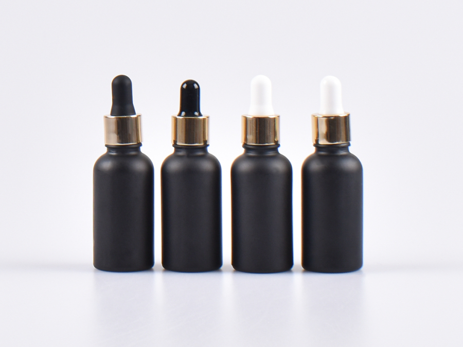 Schwarzglasflasche 50ml, mit Pipette gold