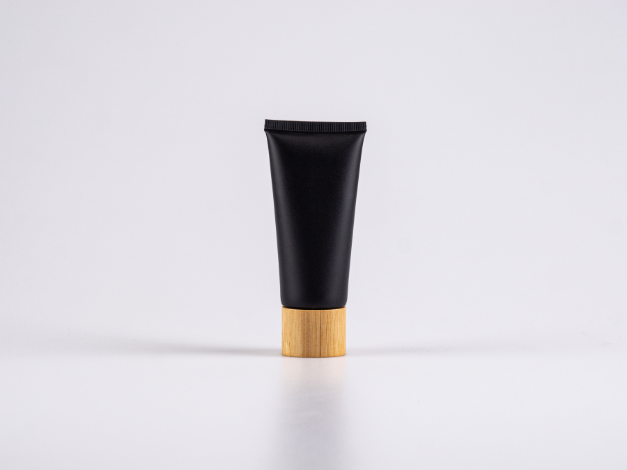 Kosmetiktube 60ml, schwarz-matt, mit Schraubverschluss Bambus