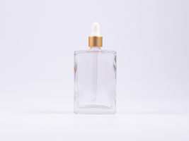 Klarglasflasche Miro 100ml - Pipette gold