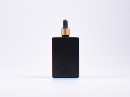 Schwarzglasflasche Miro 100ml - Pipette gold