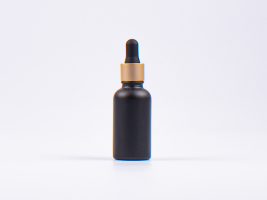 Schwarzglasflasche 30ml, mit Pipette gold